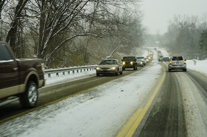 cars driving on snowy road